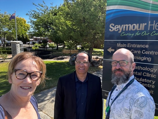 Sarah and Alfred at Seymour Health with Director of Business Services Colin James